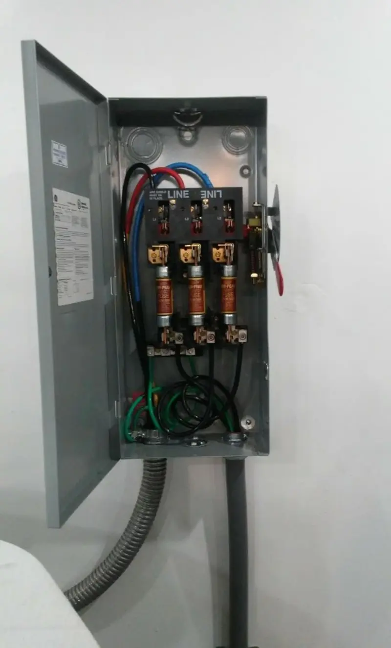 Three-phase disconnect switch installed for Smoke Detector Installation in Ball