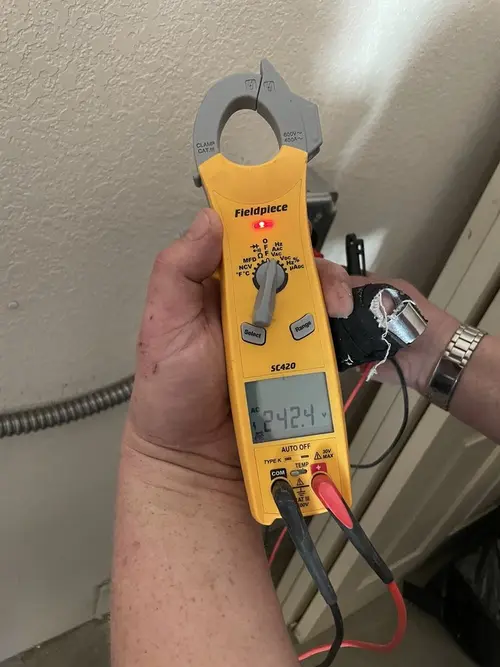 Voltage testing with clamp meter during Hot Tub / Pool Electrical Wiring in Ball
